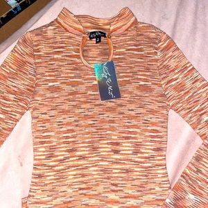 Super cute form fitting long sleeve dress that’s amazingly soft. tags still on.